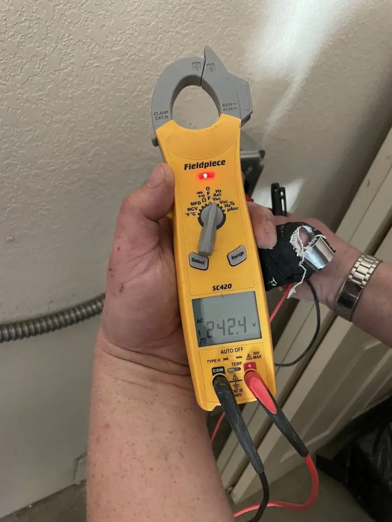 Voltage testing with clamp meter during Hot Tub / Pool Electrical Wiring in Plattsburgh